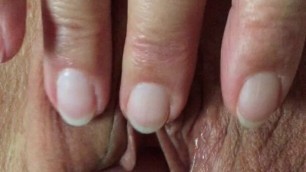 Two fingers in her pussy...