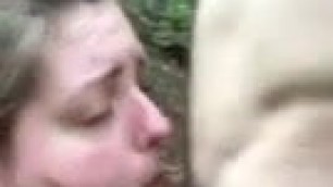Wife sucking stranger's cock outside and swallowing