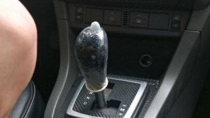 Slut jumps on the gearshift knob