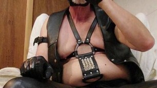 Leather dad relaxing after dinner