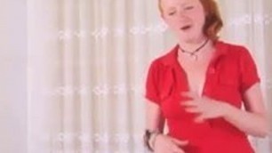 Redhead Cutie Shows Off Her Body While Conversing