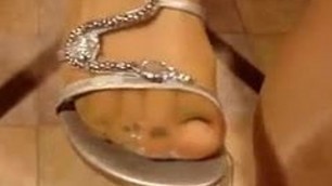 Awesome teaser and footjob from blonde Milf
